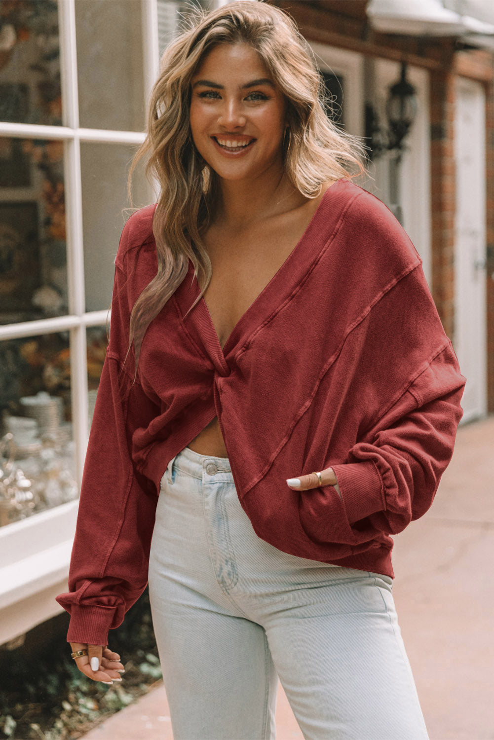 Red Exposed Seam Twist Open Back Oversized Sweatshirt - Premium Tops from Momma Done Gone Crafty- Just $50.40! Shop now at Momma Done Gone Crafty