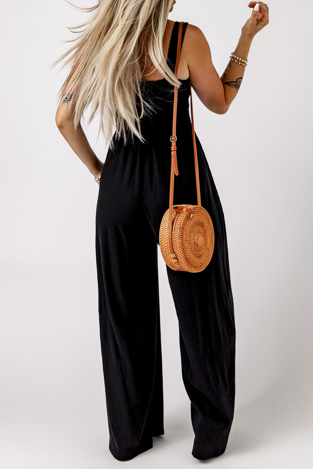 Black Smocked Sleeveless Wide Leg Jumpsuit with Pockets - Premium Bottoms from Momma Done Gone Crafty- Just $45.00! Shop now at Momma Done Gone Crafty