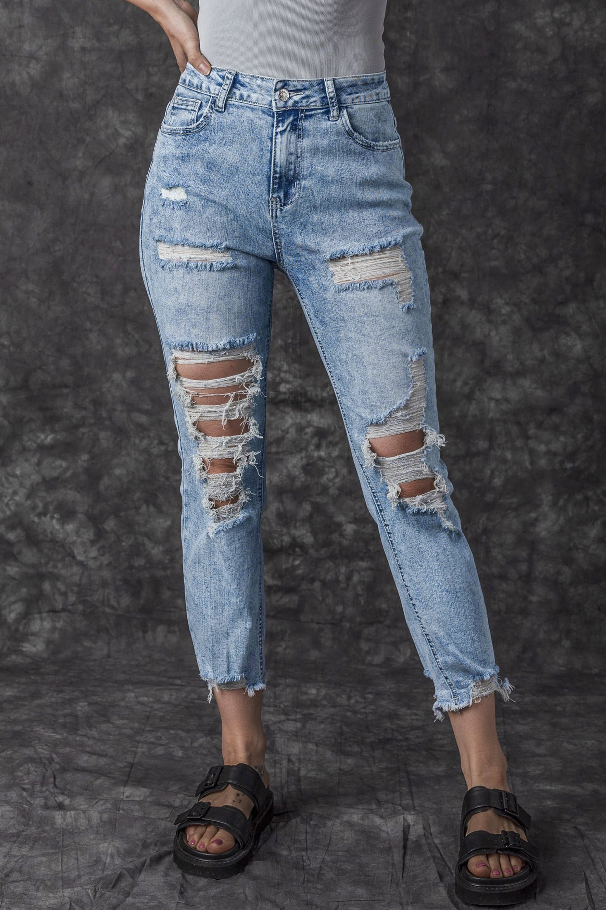 Sky Blue Acid Wash Distressed Slim Fit Jeans - Premium Bottoms from Momma Done Gone Crafty- Just $67.32! Shop now at Momma Done Gone Crafty