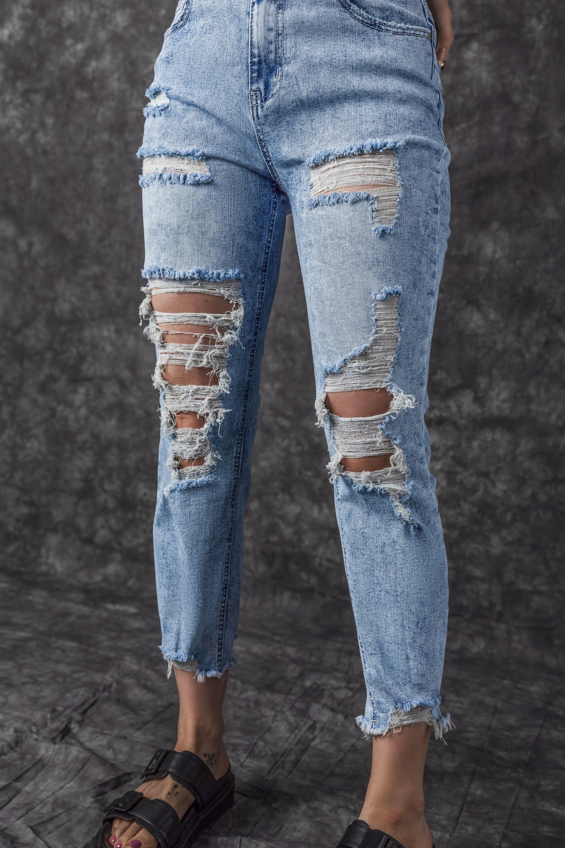 Sky Blue Acid Wash Distressed Slim Fit Jeans - Premium Bottoms from Momma Done Gone Crafty- Just $67.32! Shop now at Momma Done Gone Crafty