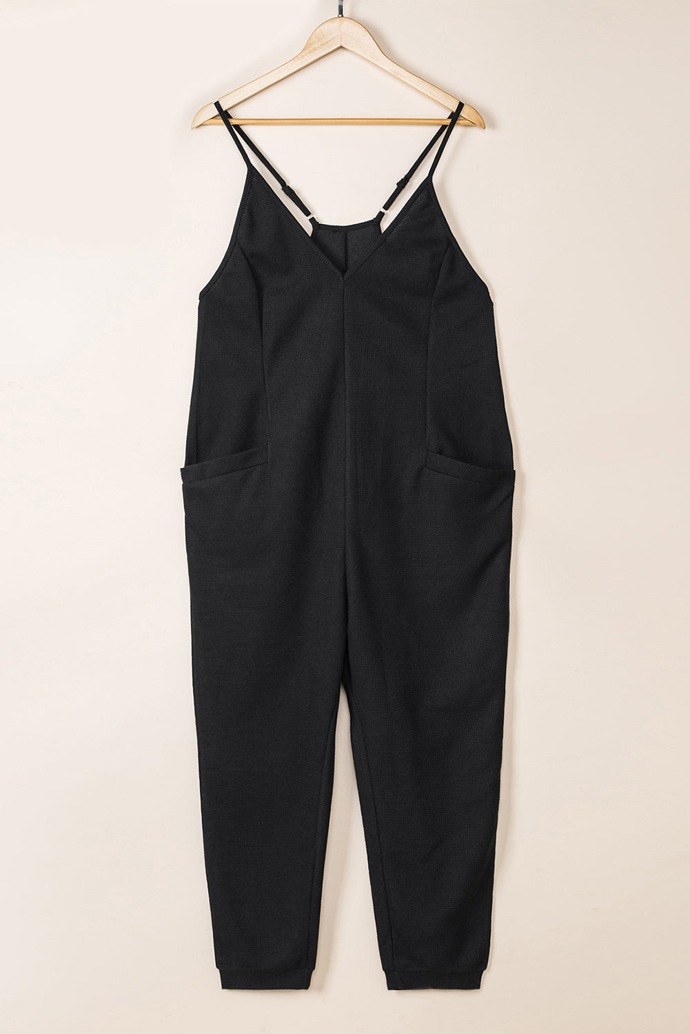 Black Textured Sleeveless V-Neck Pocketed Casual Jumpsuit - Premium Bottoms from Momma Done Gone Crafty- Just $26.99! Shop now at Momma Done Gone Crafty