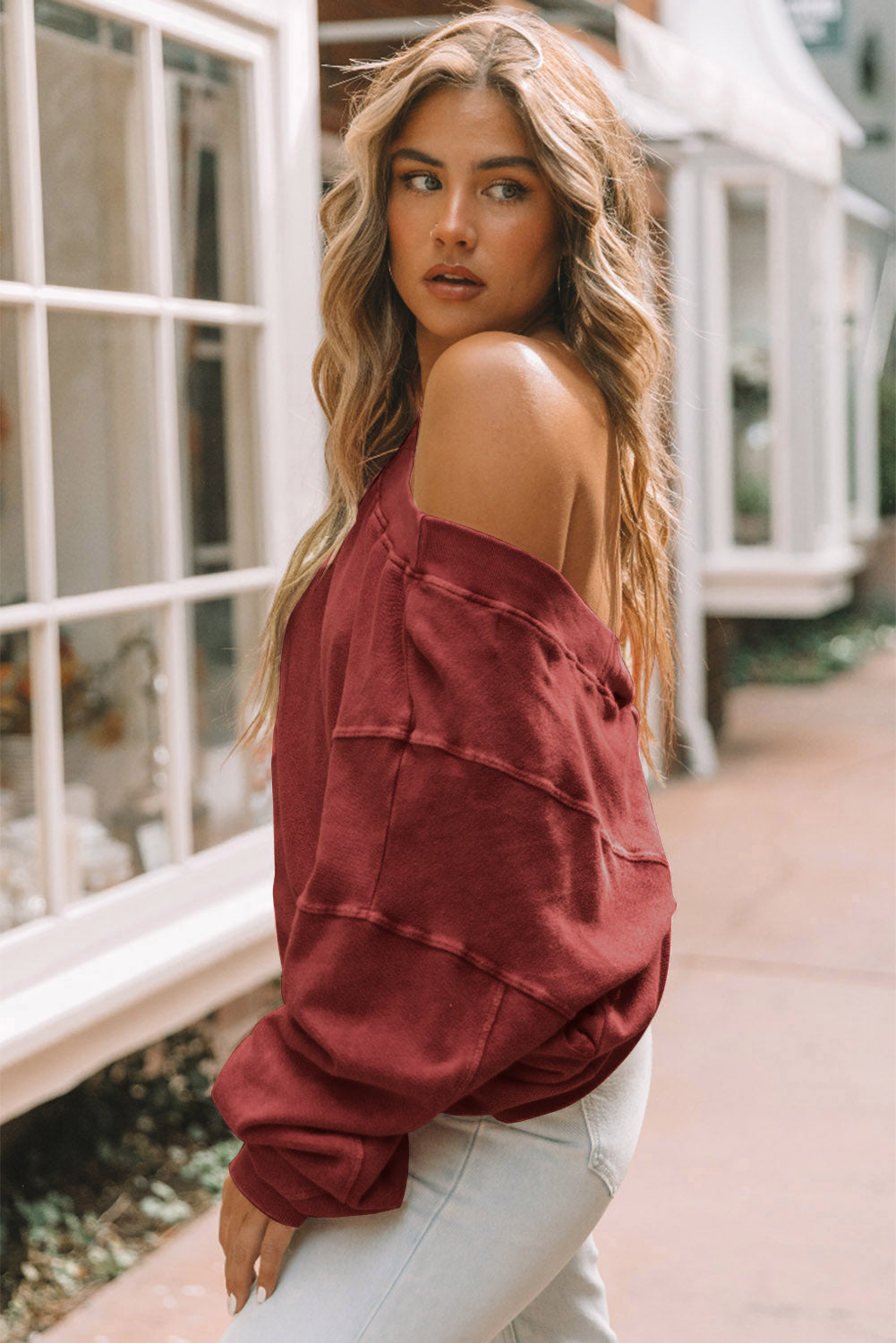 Red Exposed Seam Twist Open Back Oversized Sweatshirt - Premium Tops from Momma Done Gone Crafty- Just $50.40! Shop now at Momma Done Gone Crafty