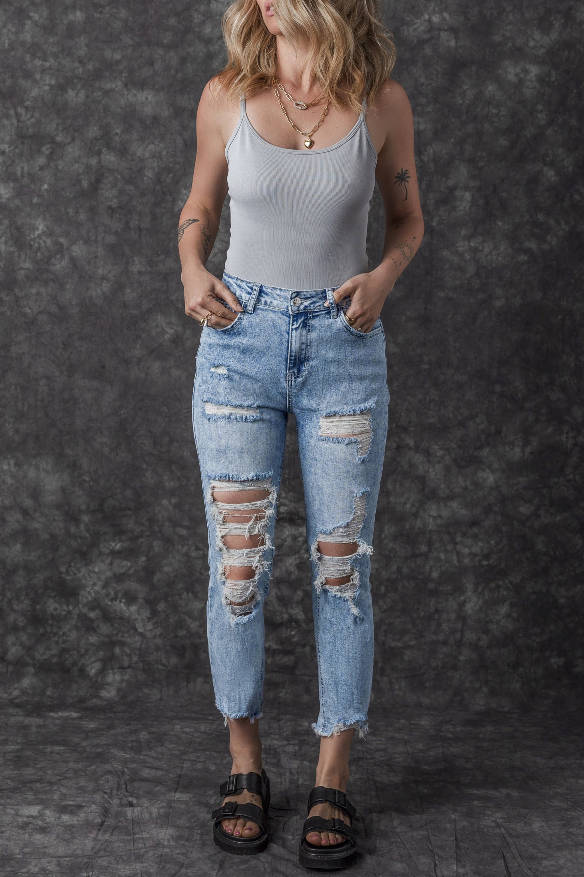 Sky Blue Acid Wash Distressed Slim Fit Jeans - Premium Bottoms from Momma Done Gone Crafty- Just $67.32! Shop now at Momma Done Gone Crafty