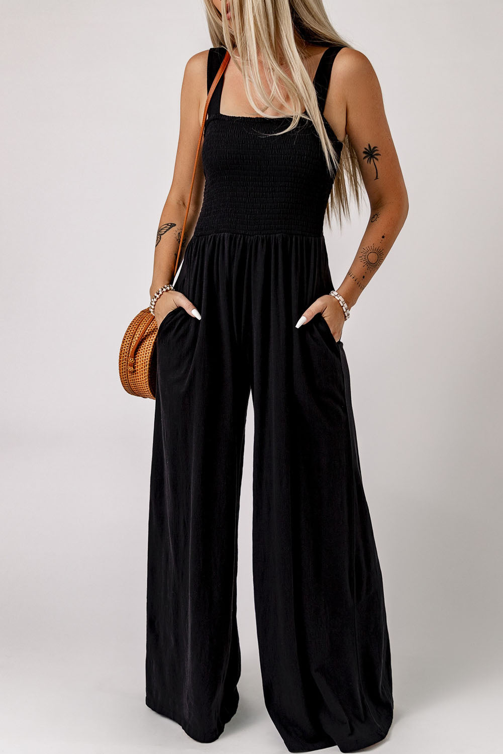 Black Smocked Sleeveless Wide Leg Jumpsuit with Pockets - Premium Bottoms from Momma Done Gone Crafty- Just $45.00! Shop now at Momma Done Gone Crafty