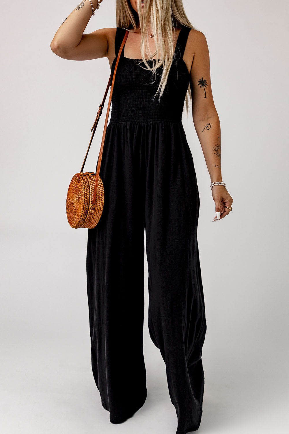 Black Smocked Sleeveless Wide Leg Jumpsuit with Pockets - Premium Bottoms from Momma Done Gone Crafty- Just $45.00! Shop now at Momma Done Gone Crafty