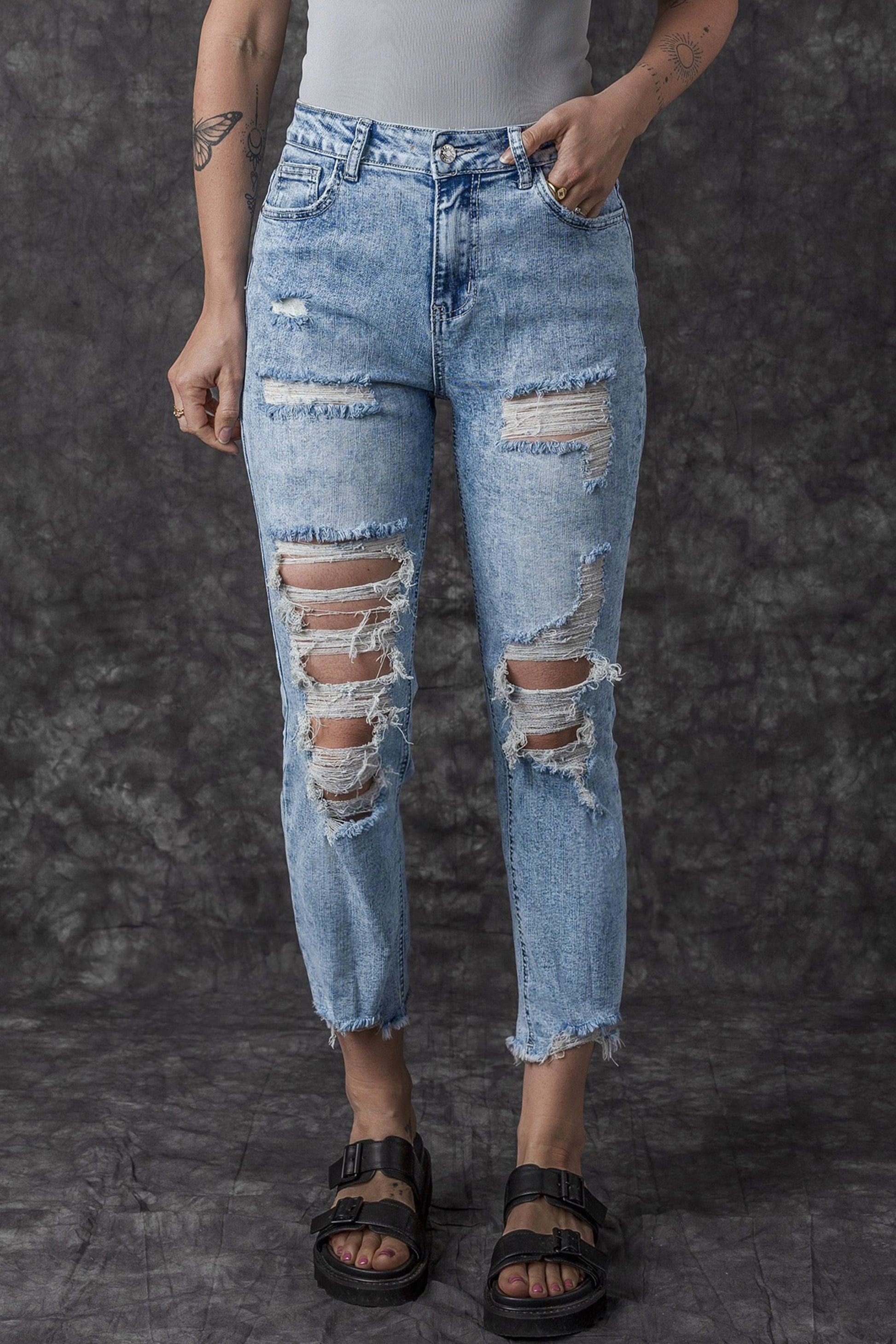 Sky Blue Acid Wash Distressed Slim Fit Jeans - Premium Bottoms from Momma Done Gone Crafty- Just $67.32! Shop now at Momma Done Gone Crafty