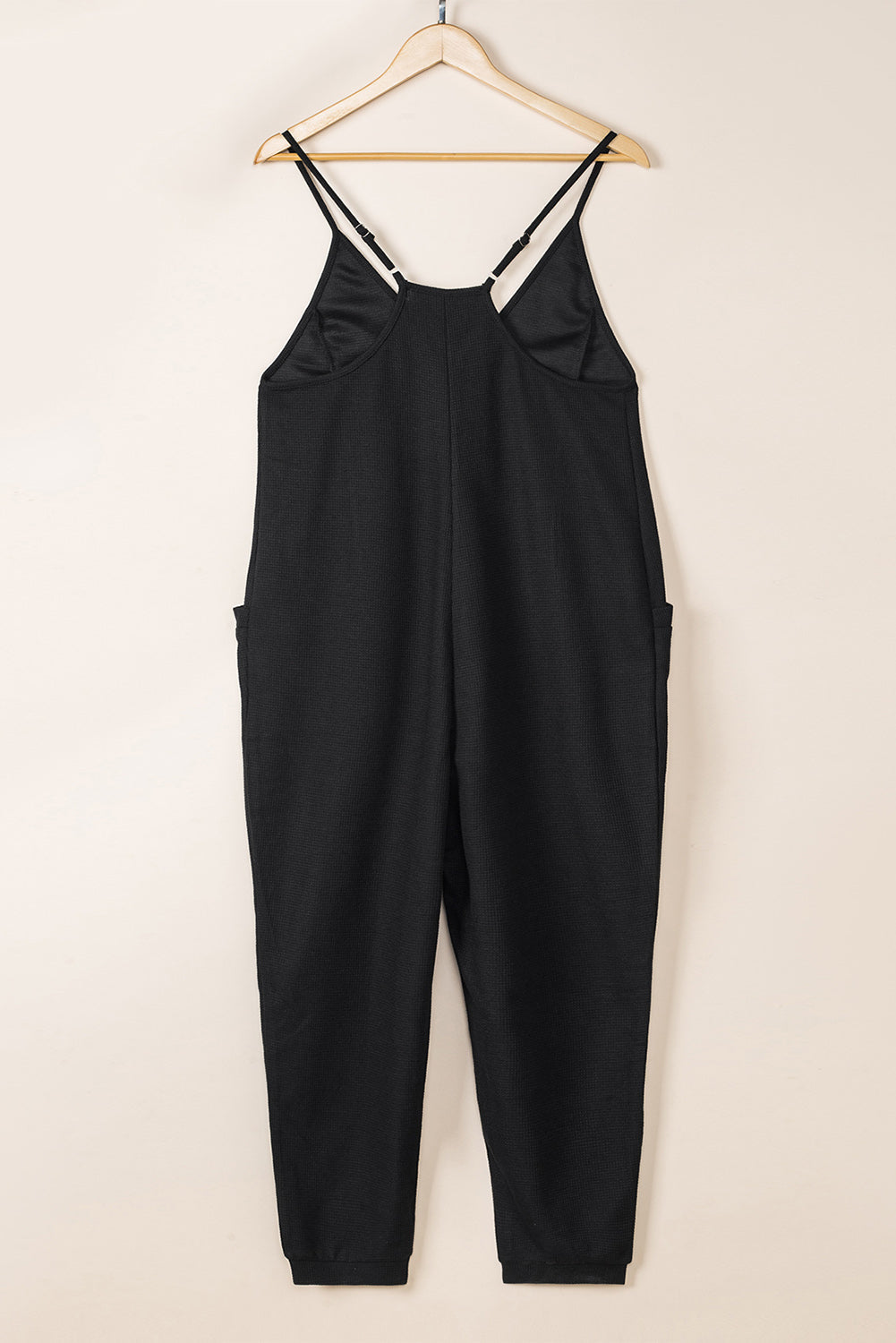 Black Textured Sleeveless V-Neck Pocketed Casual Jumpsuit - Premium Bottoms from Momma Done Gone Crafty- Just $26.99! Shop now at Momma Done Gone Crafty