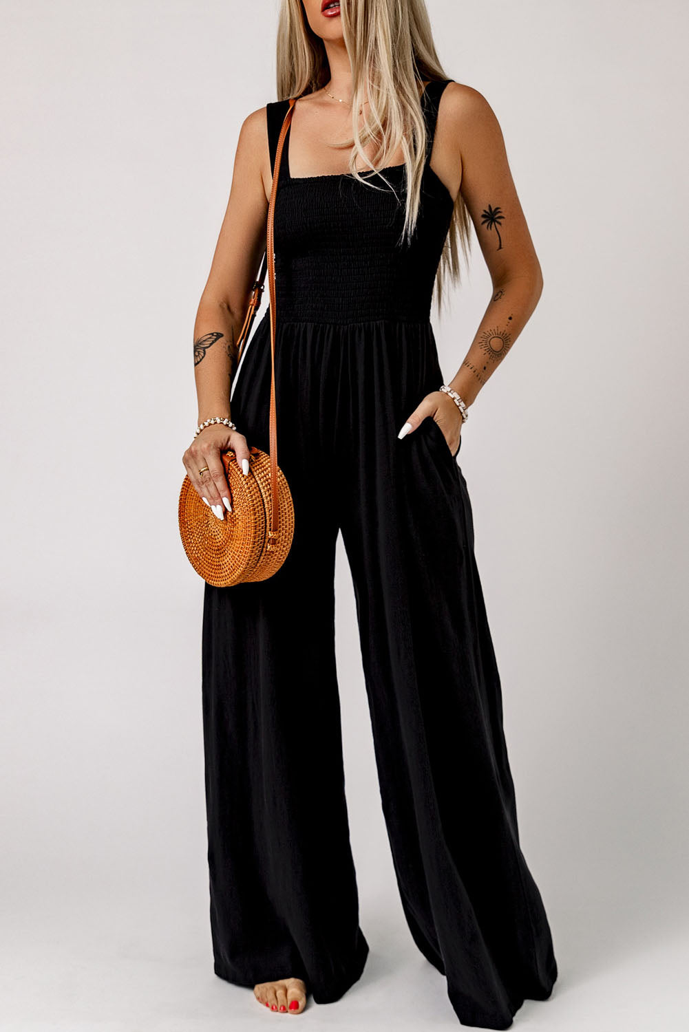 Black Smocked Sleeveless Wide Leg Jumpsuit with Pockets - Premium Bottoms from Momma Done Gone Crafty- Just $45.00! Shop now at Momma Done Gone Crafty